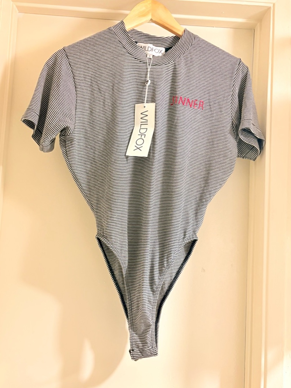 Wildfox Black & White Striped Short Sleeve Bodysuit with Pink Script